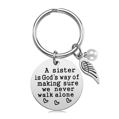 Rynx | A sister is God's way of ensuring that we never walk alone keychain