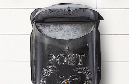 Rynx | Worn black metal mailbox