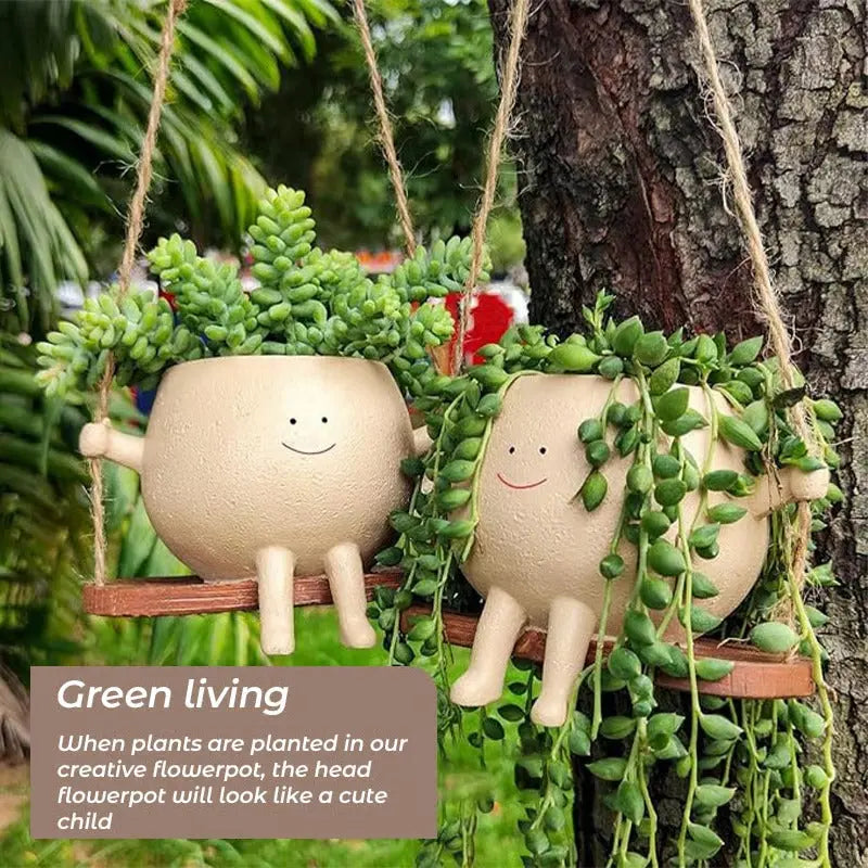 Rynx | Hanging planter with smiling face