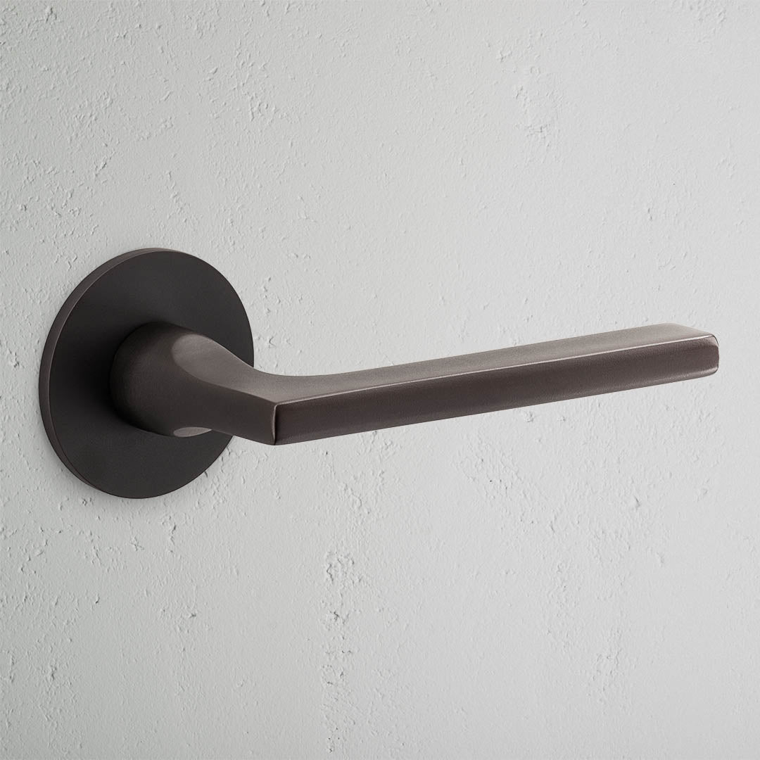 Rynx | Clayton flush rose unsprung door handle - bronze