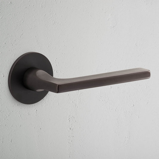Rynx | Clayton flush rose unsprung door handle - bronze