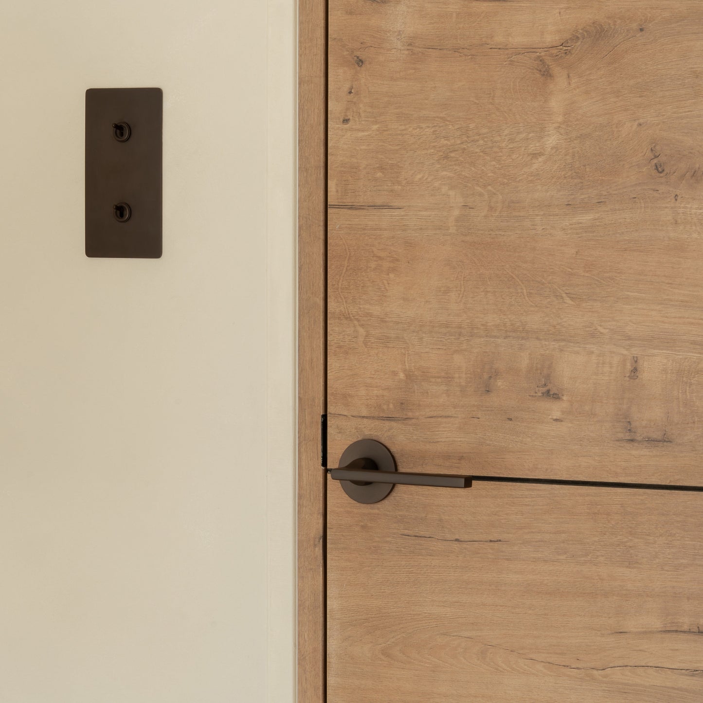 Rynx | Clayton Flush Rose Sprung Door Handle - Bronze