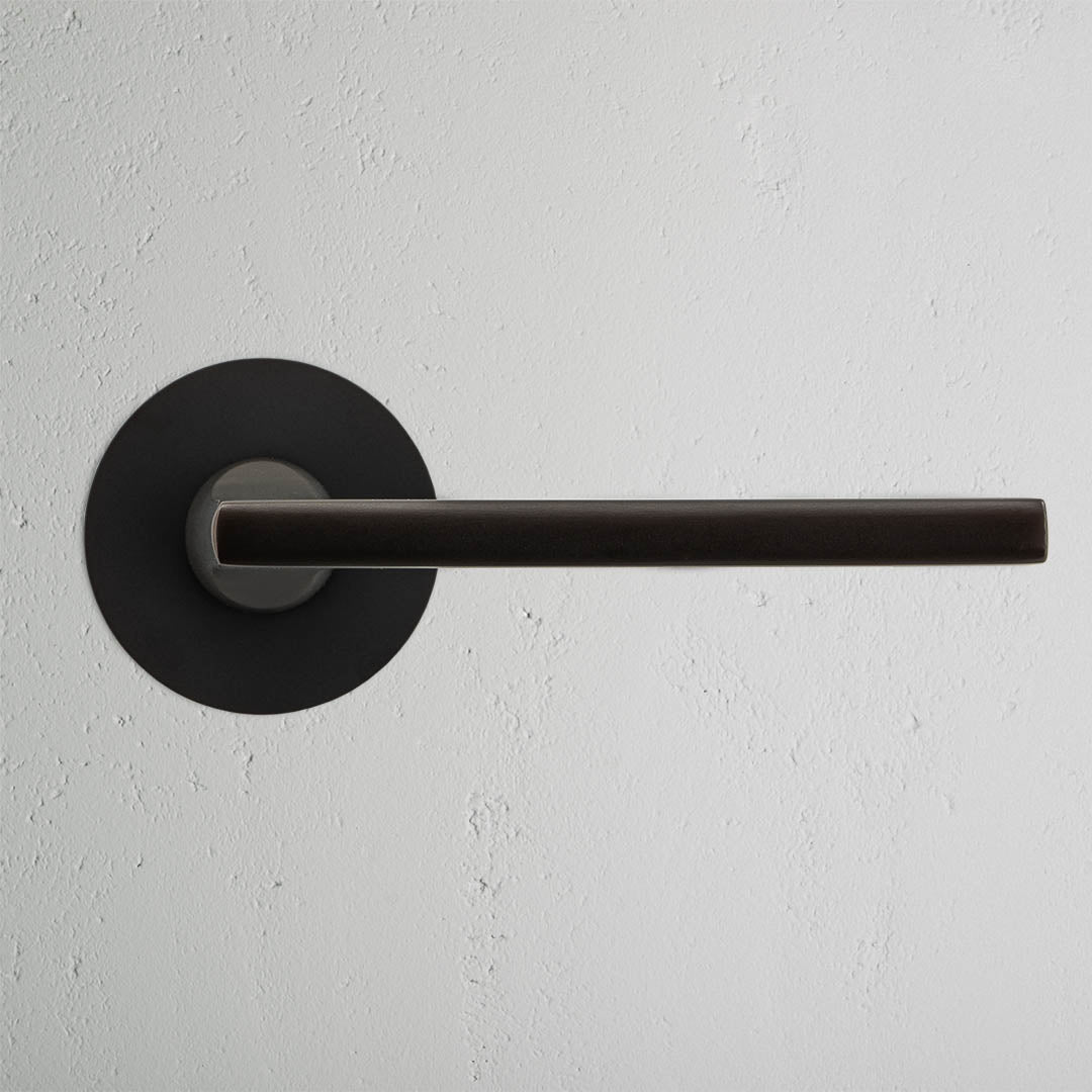 Rynx | Clayton flush rose unsprung door handle - bronze