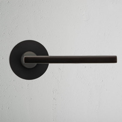 Rynx | Clayton flush rose unsprung door handle - bronze
